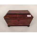 A mid 19th Century mahogany sarcophagus shaped tea caddy