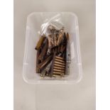 A collection of .50 cal rounds (inert) including WWII examples and drill rounds,