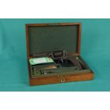 A cased 'Webley' style open frame revolver, approx 80 bore with 4 1/2" barrel,