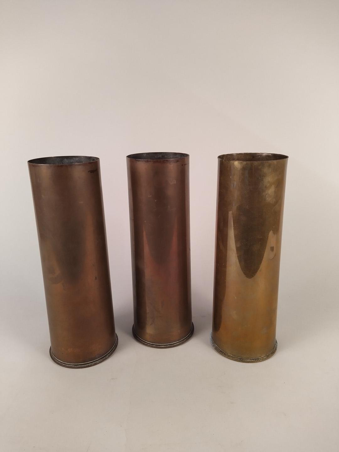 A collection of ten brass shell cases (WWII dated and later) with a copper and brass bugle and two - Image 3 of 3