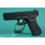 A 'Umarex' .177 cal CO2 air pistol being a Glock 22 licensed product