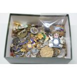 A box of mainly military related badges,