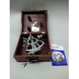 A mid 20th Century cased 'drum-sextant' with instruction book,