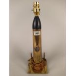 A brass shell case (inert with four rifle rounds) crafted into a table lamp with the Kings Regiment