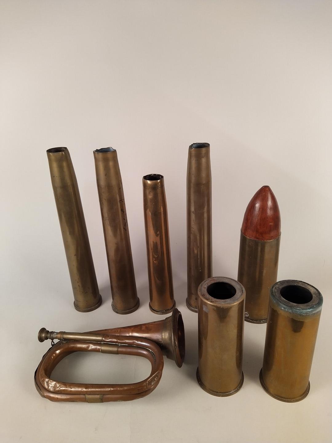 A collection of ten brass shell cases (WWII dated and later) with a copper and brass bugle and two - Image 2 of 3