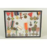A display case of continental medals, medallions etc,