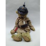 A vintage Teddy bear wearing a period pickelhaube,