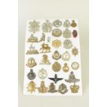 A collection of thirty one military badges/insignia