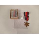 A boxed group of four WWII medals with issue certificate