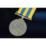 A Korea medal to 7043619 Sgt.R.W.