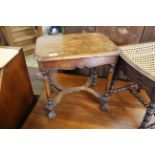 A Victorian walnut x-framed low table