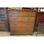 An Edwardian inlaid mahogany four drawer chest