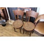 A pair of early 20th Century bentwood cafe chairs