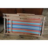 Four vintage beech deck chairs marked 'Atcraft'