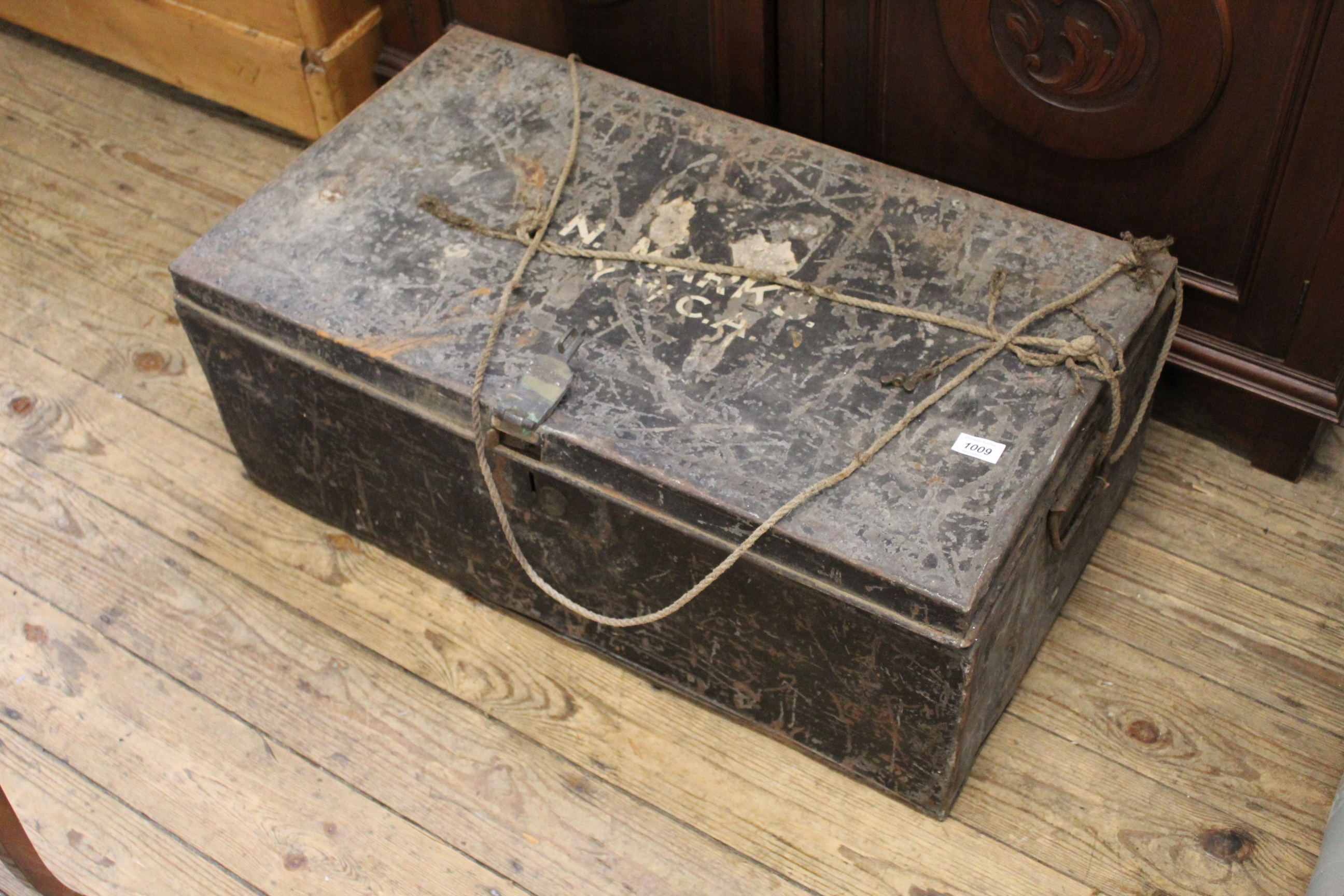 A vintage metal travelling trunk