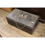 A vintage metal travelling trunk