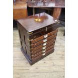 A 20th Century mahogany inlaid six drawer chest of drawers with lift up lid,