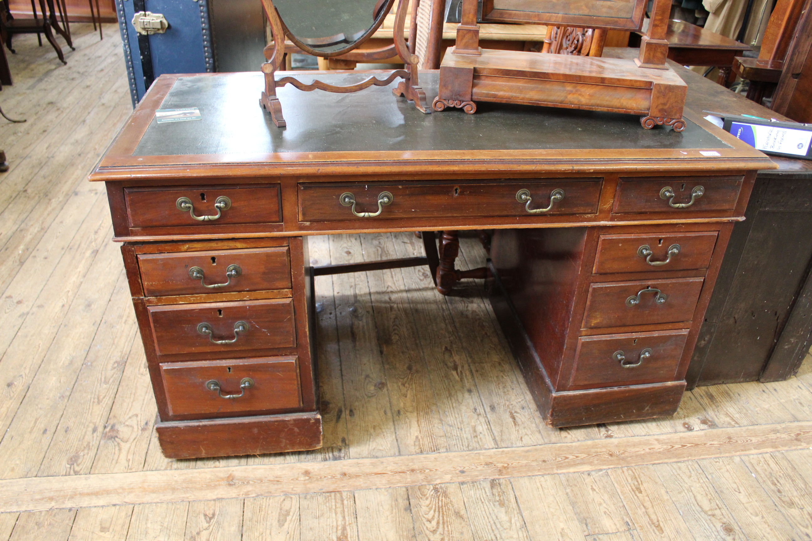 An Edwardian mahogany pedestal desk,