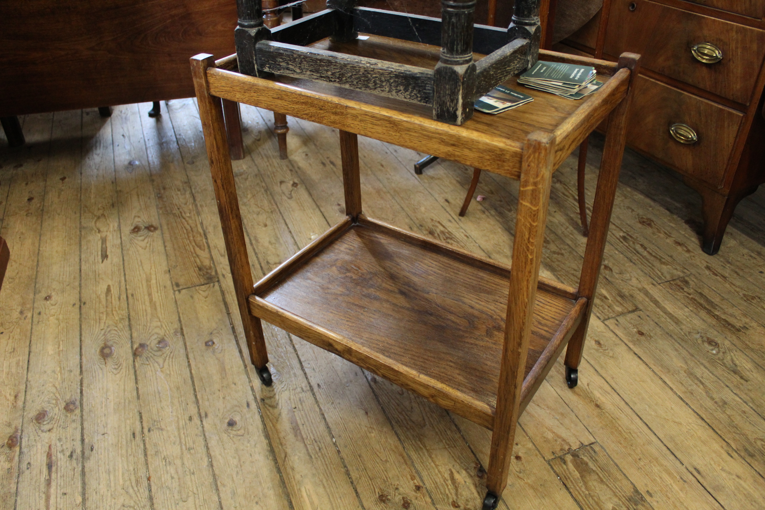 A 1940's oak two tier hostess trolley