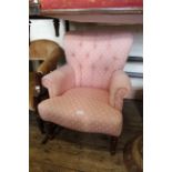 A Victorian style pink upholstered chair