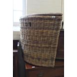 A substantial wicker corner log basket