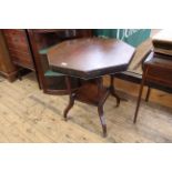 An Edwardian mahogany two tier occasional table