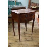 A mahogany two drawer side table in Georgian style with ring handles