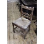 A 19th Century oak stretcher chair