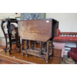 A late 19th Century oak gate leg table