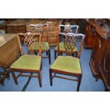 Four Mahogany Dining Chairs with Green Velvet Upholstery