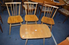 Three Ercol Chairs and a Coffee Table