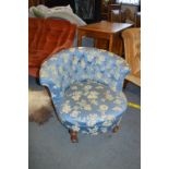 Circular Nursing Chair with Blue Floral Upholstery