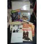 Beatles LPs and Assorted Singles Including White Album Early Pressing