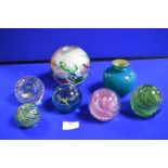 Five Glass Paperweights and Two Glass Vases