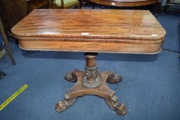 Victorian Figured Mahogany Tea Table on Carved Pedestal with Ball & Claw Feet