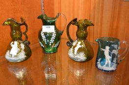 Four Victorian Mary Gregory Blue and Green Glass Jugs