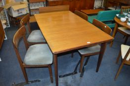 Ercol Teak Drawer Leaf Dining Table with Four Green Upholstered Chairs