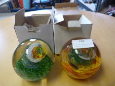 *Two Paperweights
