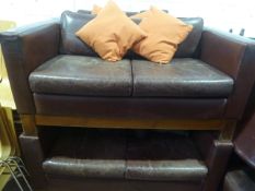 * 2 x distressed red leather sofas with throw cushions 1500w x 800d x 700h