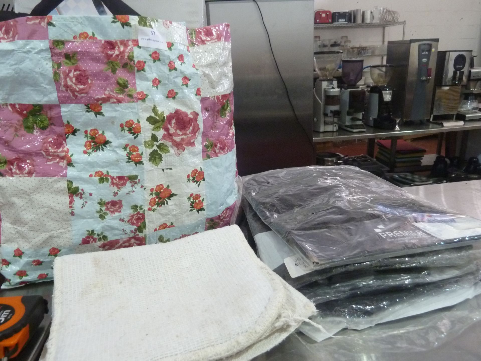 * bag of misc textiles - oven cloths, black shirts, etc