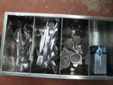 * S/S cutlery tray with some cutlery and tea strainers