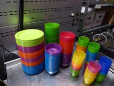 *selection of colourful plastic crockery - approx 100 x plates, 100 x bowls, 40 x cups