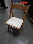 *Plastic Crate Containing 24 Folding Beech Chair with Cream Vinyl Seat Pad