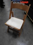 *Plastic Crate Containing 24 Folding Beech Chair with Cream Vinyl Seat Pad