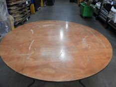 *Stillage Containing Sixteen 5'6" Circular Banqueting Tables with Folding Legs