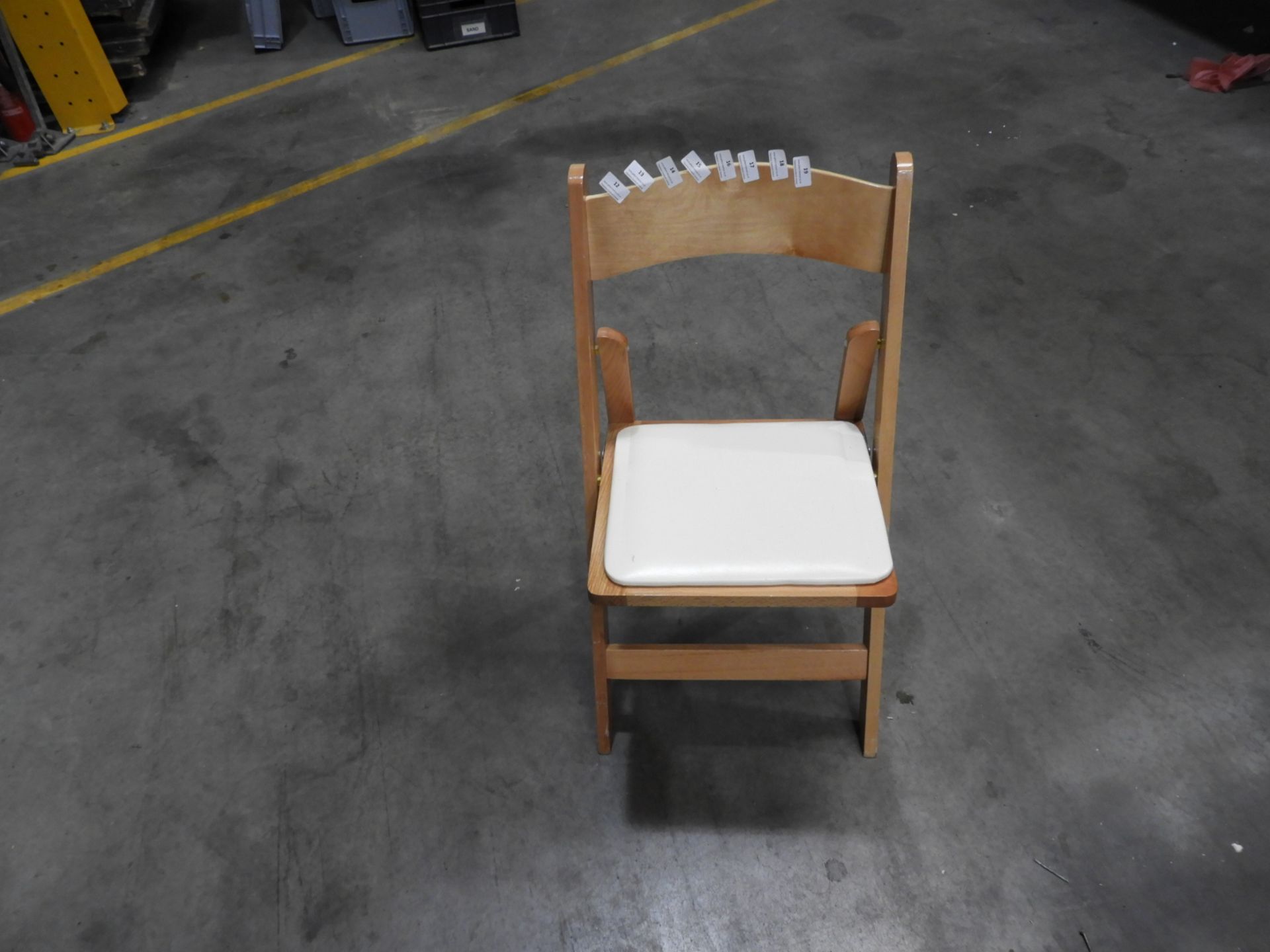 *Box Containing 24 Folding Beech Chairs with Cream Upholstered Seats Pad