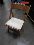 *Plastic Crate Containing 24 Folding Beech Chair with Cream Vinyl Seat Pad