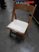 *Plastic Crate Containing 24 Folding Beech Chair with Cream Vinyl Seat Pad