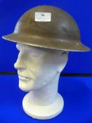 WWII British Helmet with Original Lining and Chin Strap