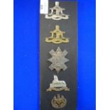 Five Army Cap Badges